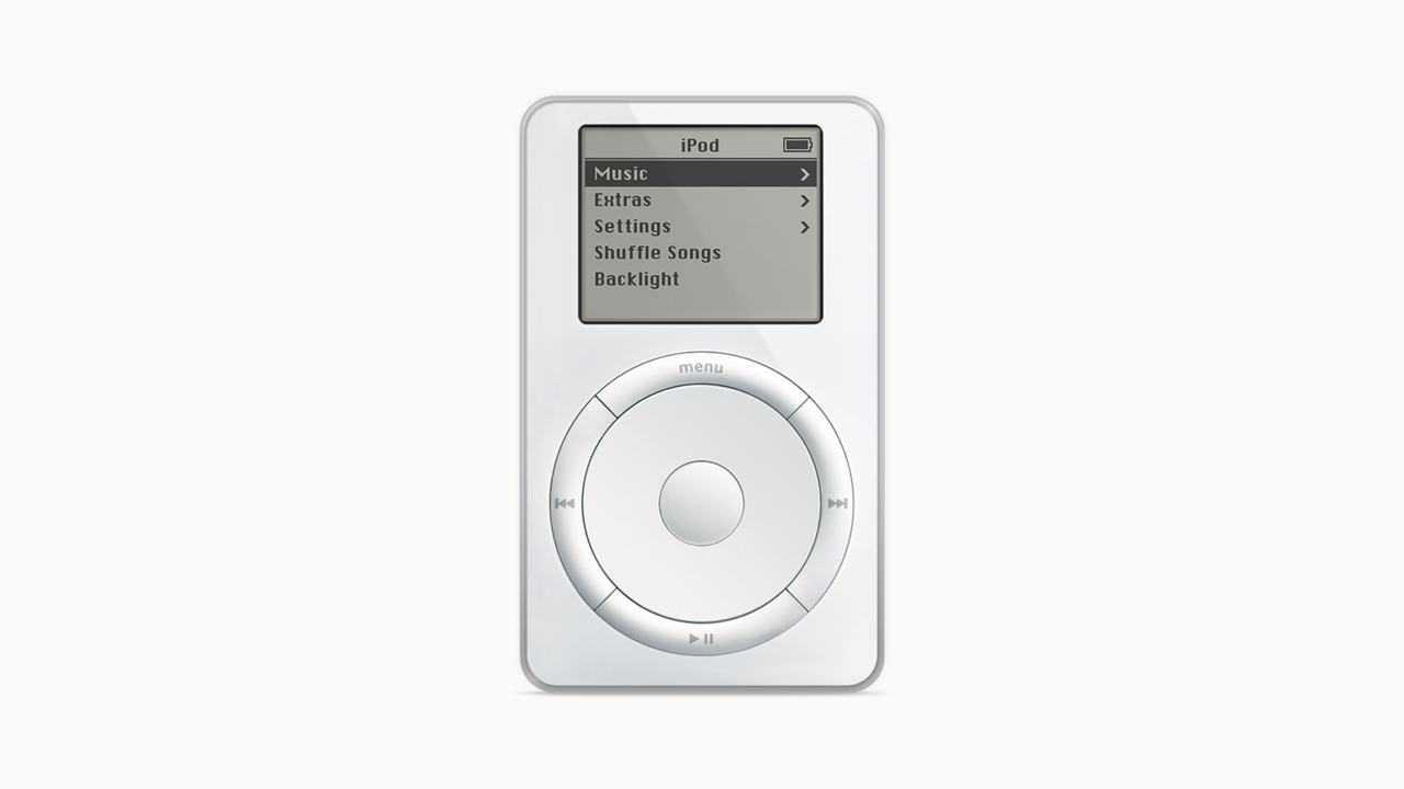 2001年10月23日発売の初代iPod。6.5オンスのボディに1,000曲の楽曲と10時間再生可能なバッテリーを搭載した最初のMP3プレイヤー